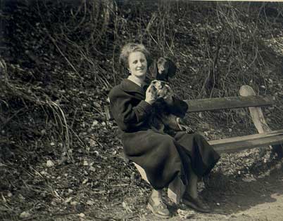 My grandmother (probably in the castle park) Rosina HIESBÖCK with dog Daggi